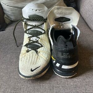 Nike, black and cream with yellow swoosh basketball sneakers